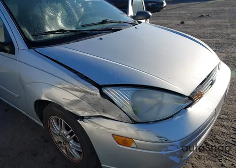 2003 Ford Focus Zx5 z USA, uszkodzony, nr VIN 3FAFP37343R186112